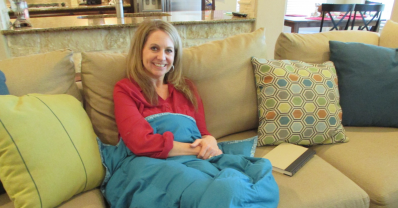 woman using a weighted blanket